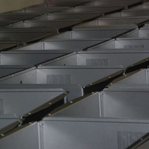 Rows of sheet metal enclosures